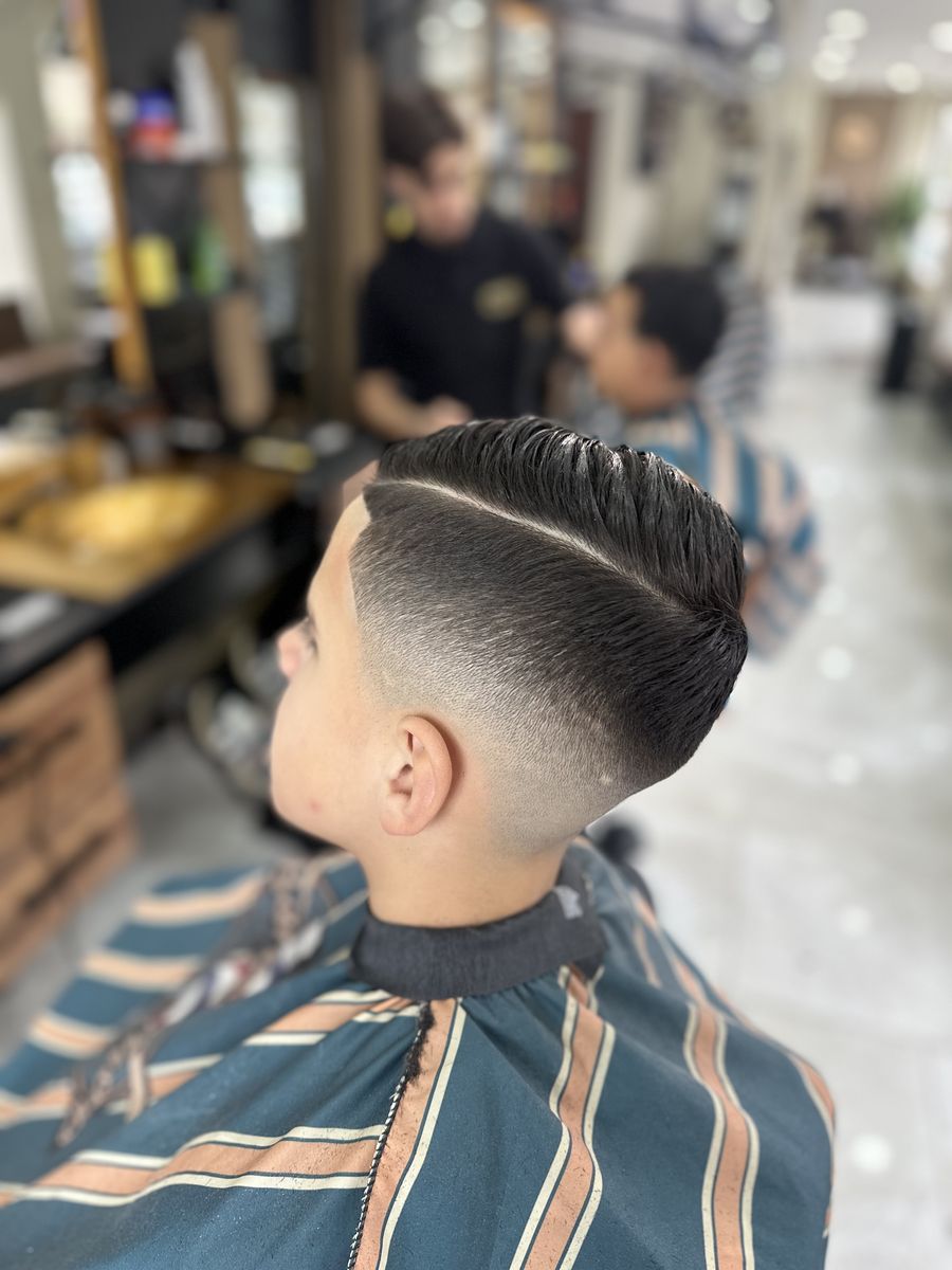 Hard part with skin fade at OTB's Barberhouse
