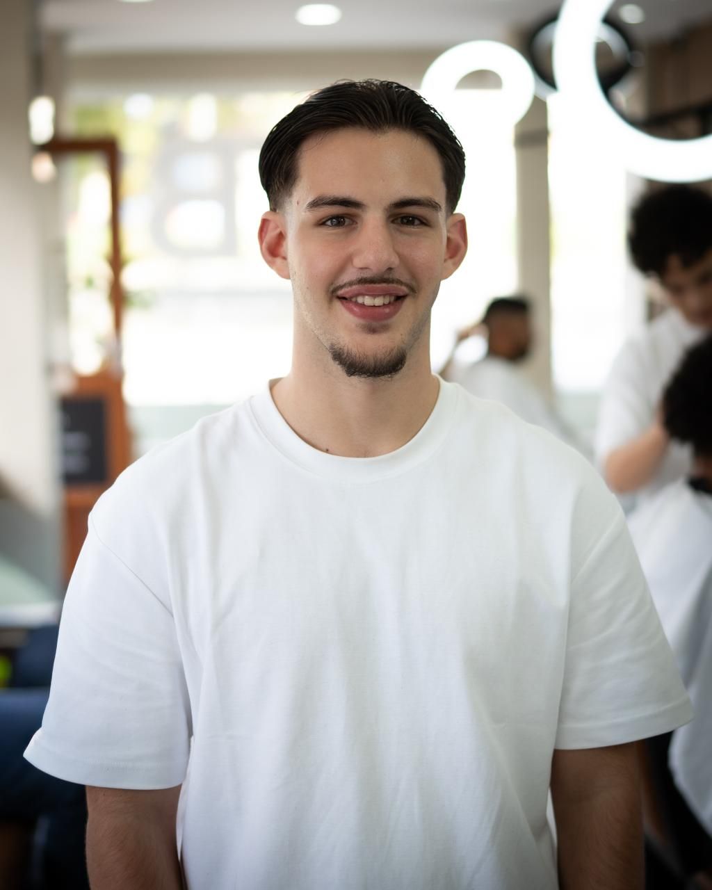 Hamza, barber at OTB's Barberhouse